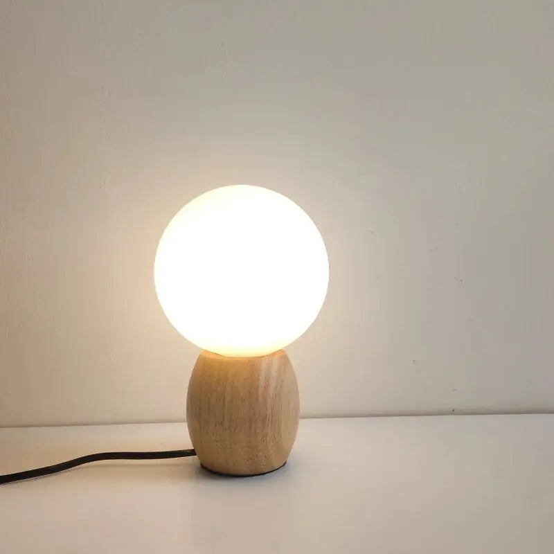 Spherical wooden bedside table lamp noctivehome.uk